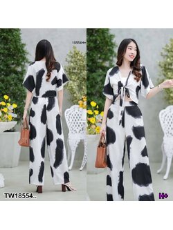 kudapy set 2 ชิ้น เสื้อผูกโบว์พิมพ์ลายขาวดำ + กางเกงขายาวทรงปล่อย