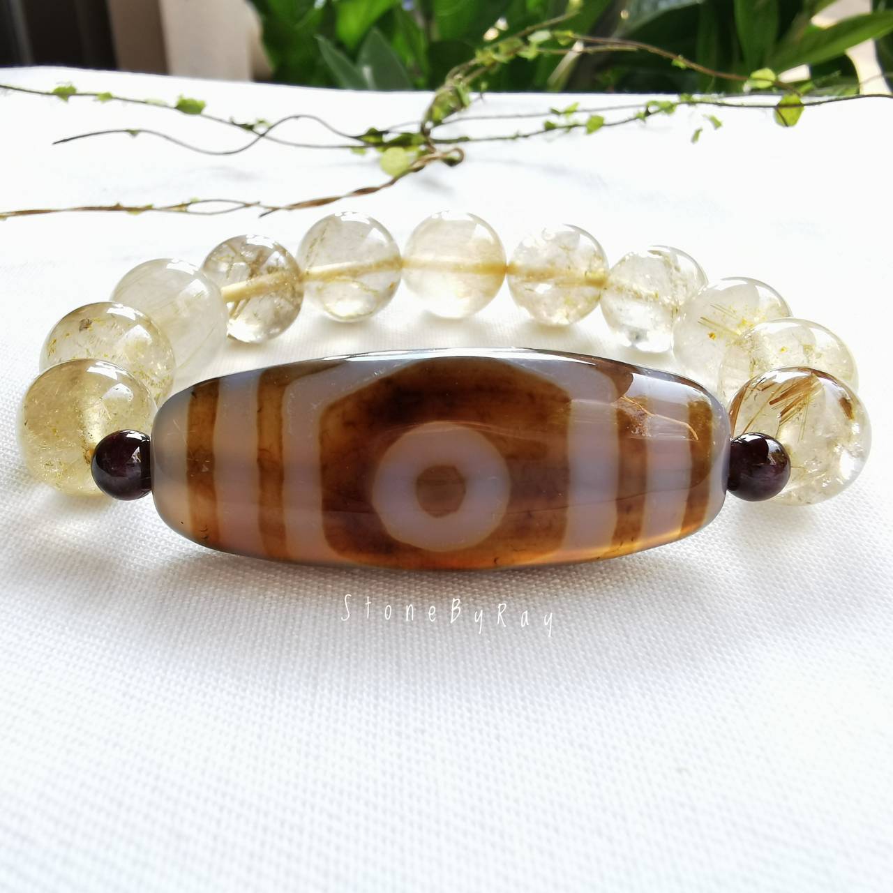 สร้อยข้อมือหินไหมทองกับหินDziลายสามตา