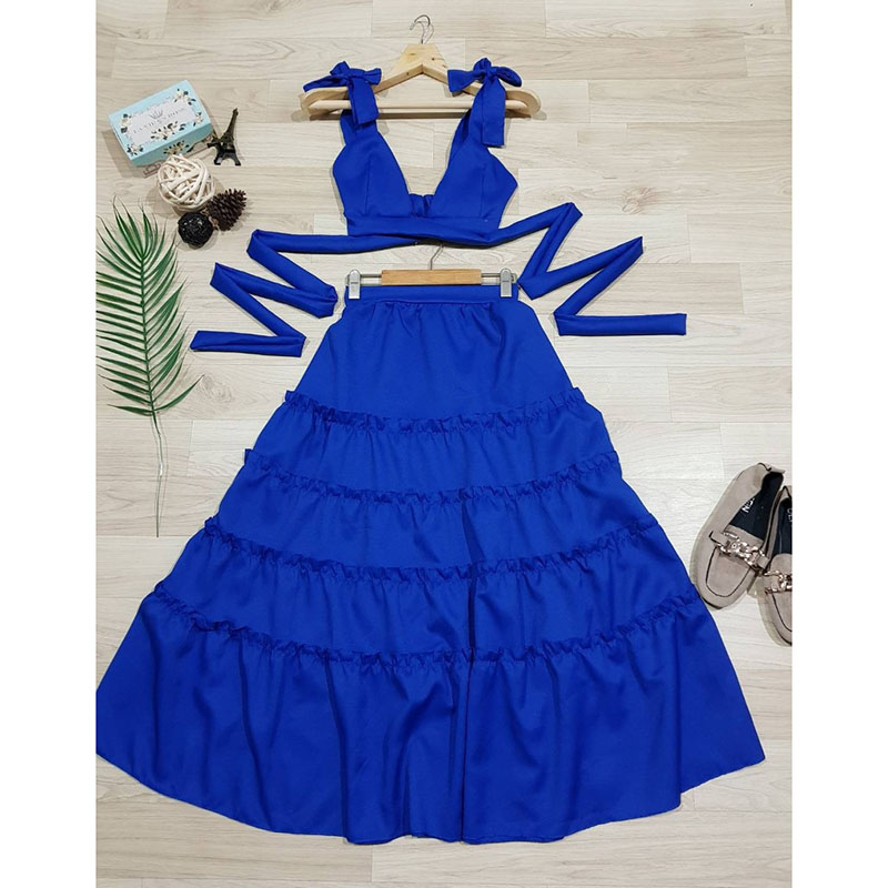 kudapy set 2 ชิ้น สีเหลือง เสื้อบราผูกไหล่ แต่งสายไขว้ผูกหลังเนื้อผ้าโฟร์เวย์สีพื้น + กระโปรงยาว แต่งระบายชั้นๆ เอวสม็อกหลัง