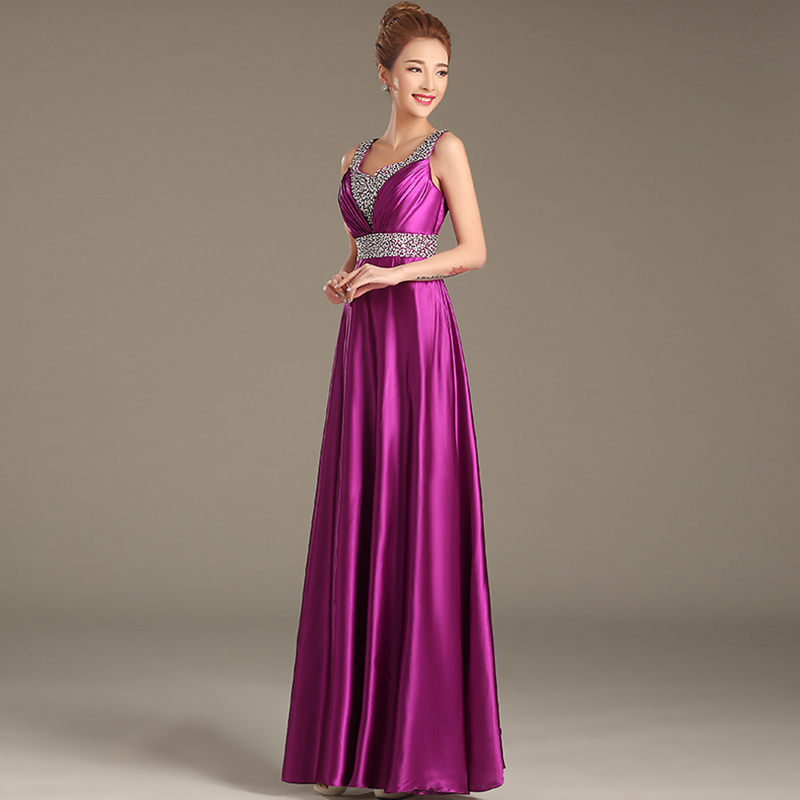 kudapy ชุดราตรียาวสีม่วง คอวี จับเดรปหน้าอก ปักเลือมช่วงอกและเอว