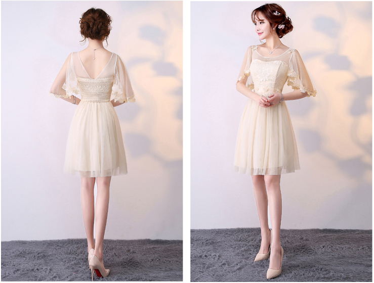 kudapy ชุดราตรีไปงานแต่งสีครีมเบจ แต่งผ้าคลุมแขนประดับผีเสื้อน่ารักมากๆ เอวสม็อคหลัง