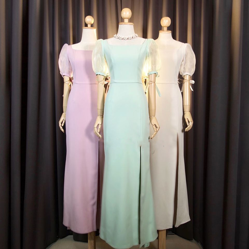 kudapy เดรสยาวออกงานสีครีมงาช้าง/เขียวพิตาชิโอ้/ชมพูอ่อน/ชมพูเข้ม/กรมท่า คอเหลี่ยม แขนตุ๊กตา ผูกโบว์ปรับขยายไซส์แขนได้ หรือ ดึงไหล่ลงแบบเปิดบ่า กระโปรงหางปลา