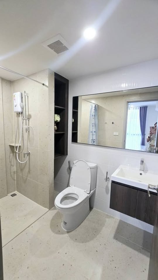 ให้เช่าห้องแบบ 1ห้องนอน 1ห้องน้ำ โซนพื้นที่ BTS คูคต คอนโด Nue Cross Khu Khot Station (นิว ครอส คูคต สเตชัน) ขนาดห้อง 27 ตรม. ชั้น 2 ตึก A