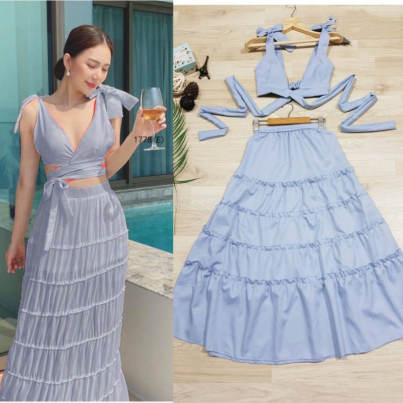 kudapy set 2 ชิ้น สีเหลือง เสื้อบราผูกไหล่ แต่งสายไขว้ผูกหลังเนื้อผ้าโฟร์เวย์สีพื้น + กระโปรงยาว แต่งระบายชั้นๆ เอวสม็อกหลัง