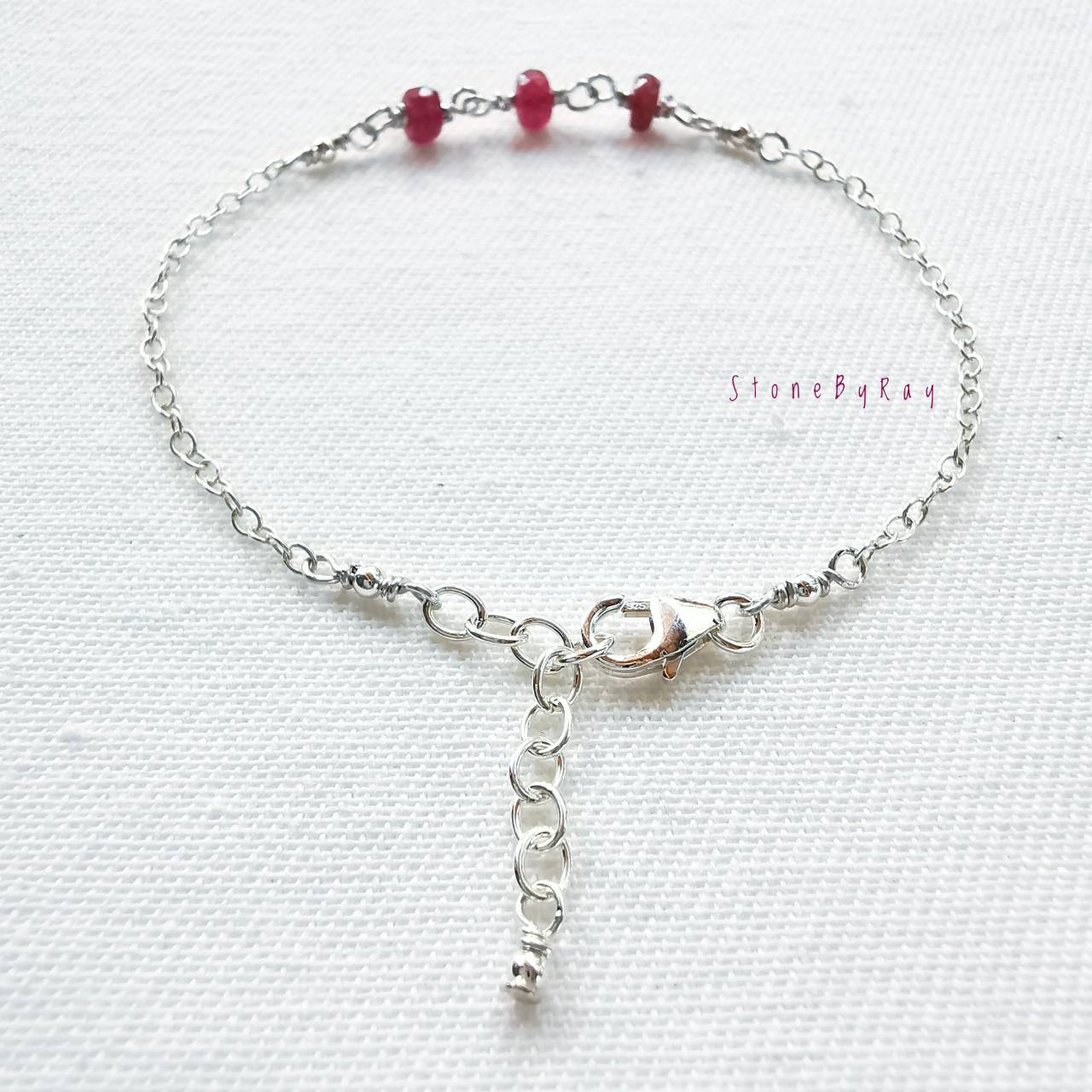 สร้อยข้อมือเงินดีไซน์กับพลอยทับทิมแท้(Ruby)