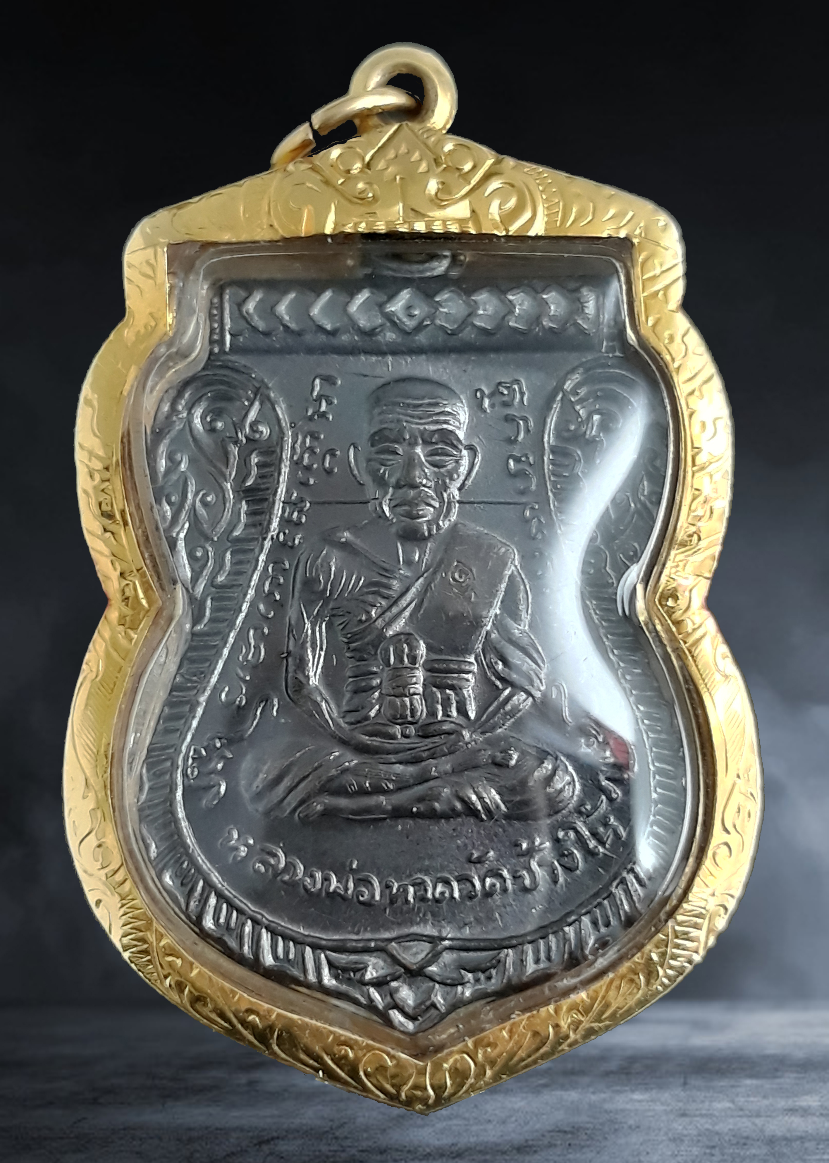 เหรียญ หลวงปู่ทวด อาจารย์นอง วัดทรายขาว จ.ปัตตานี เนื้อทองแดง หมายเลข ๕๔๓ ปี ๒๕๔๐ เลี่ยมทองคำ