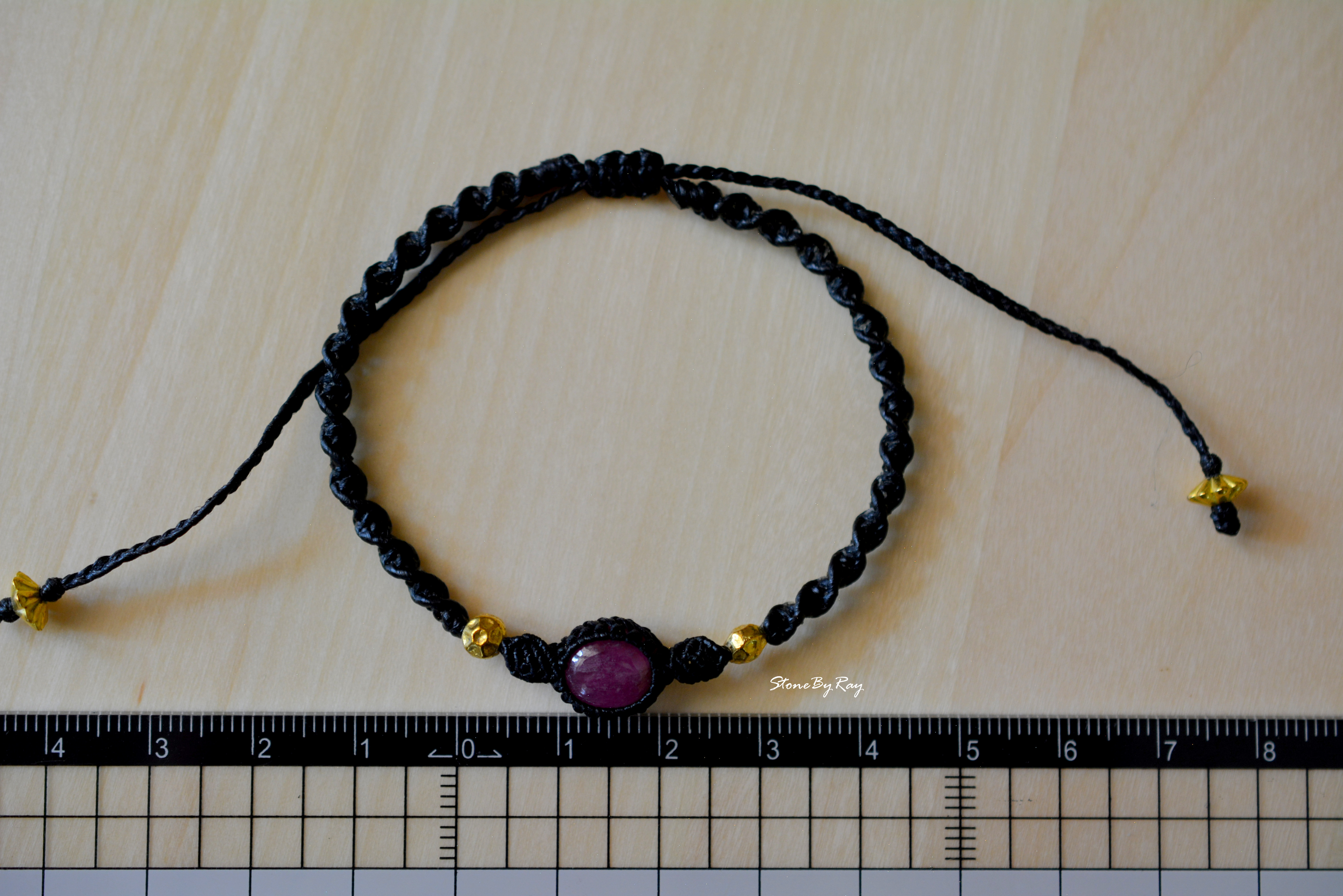 สร้อยข้อมือเชือกถักกับพลอยทับทิม(Ruby)
