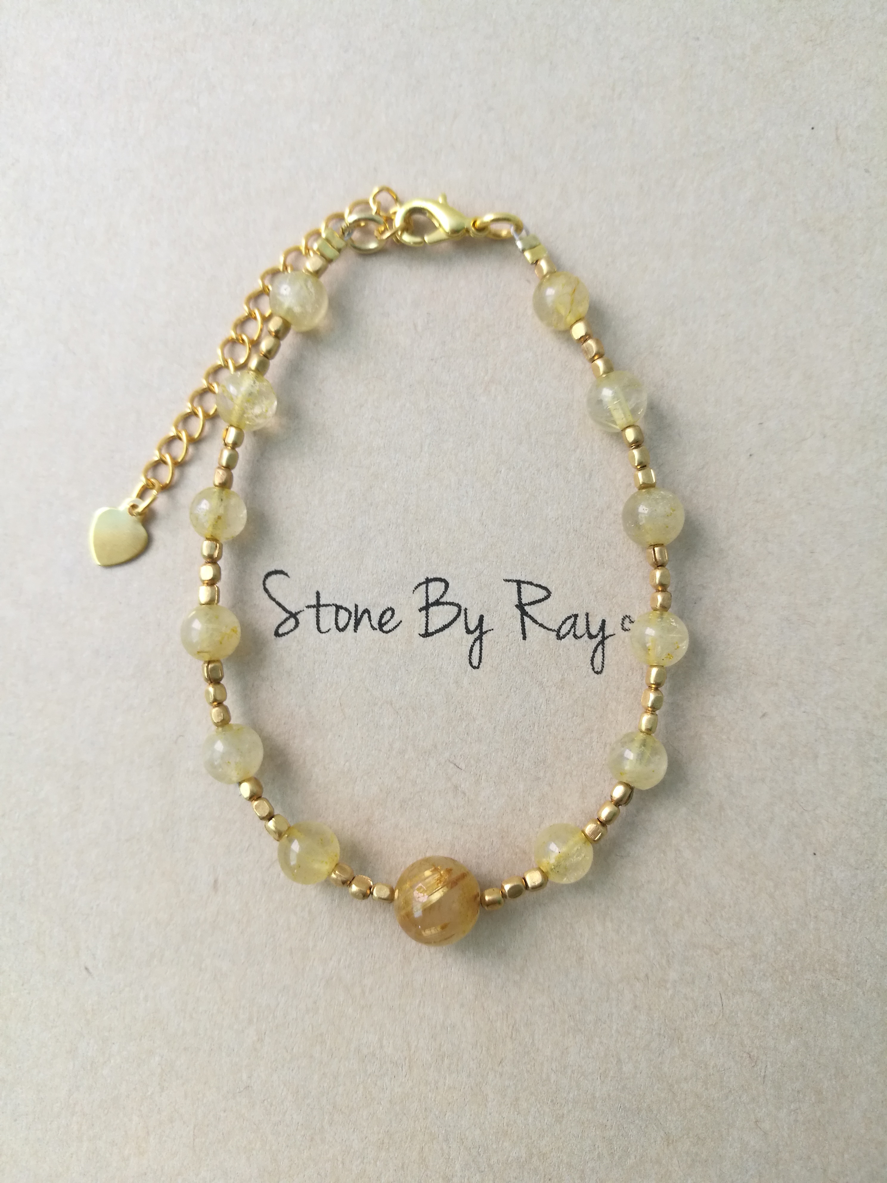 สร้อยข้อมือหินไหมทอง