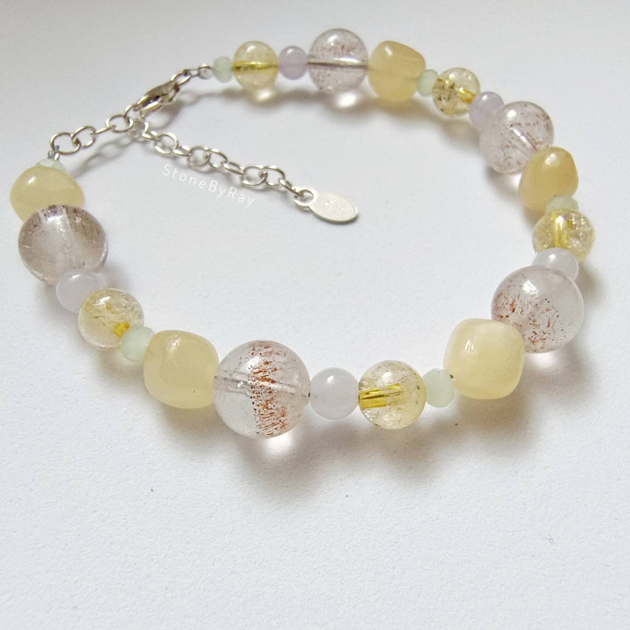 สร้อยข้อมือเงินหินแคลไซต์กับเฮมาไทต์ควอตซ์ (Calcite+Hematite Quartz)