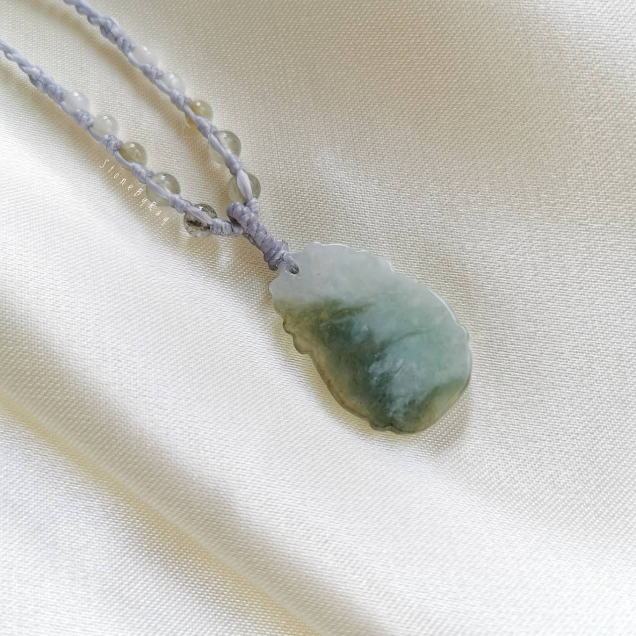 สร้อยคอเชือกถักจี้หินหยกแกะสลักปีเถาะ(Jade)