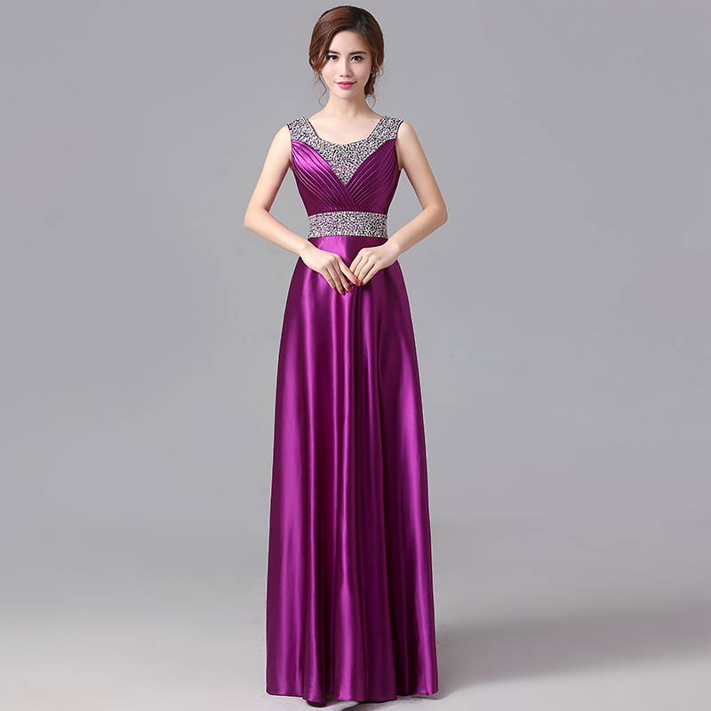 kudapy ชุดราตรียาวสีม่วง คอวี จับเดรปหน้าอก ปักเลือมช่วงอกและเอว