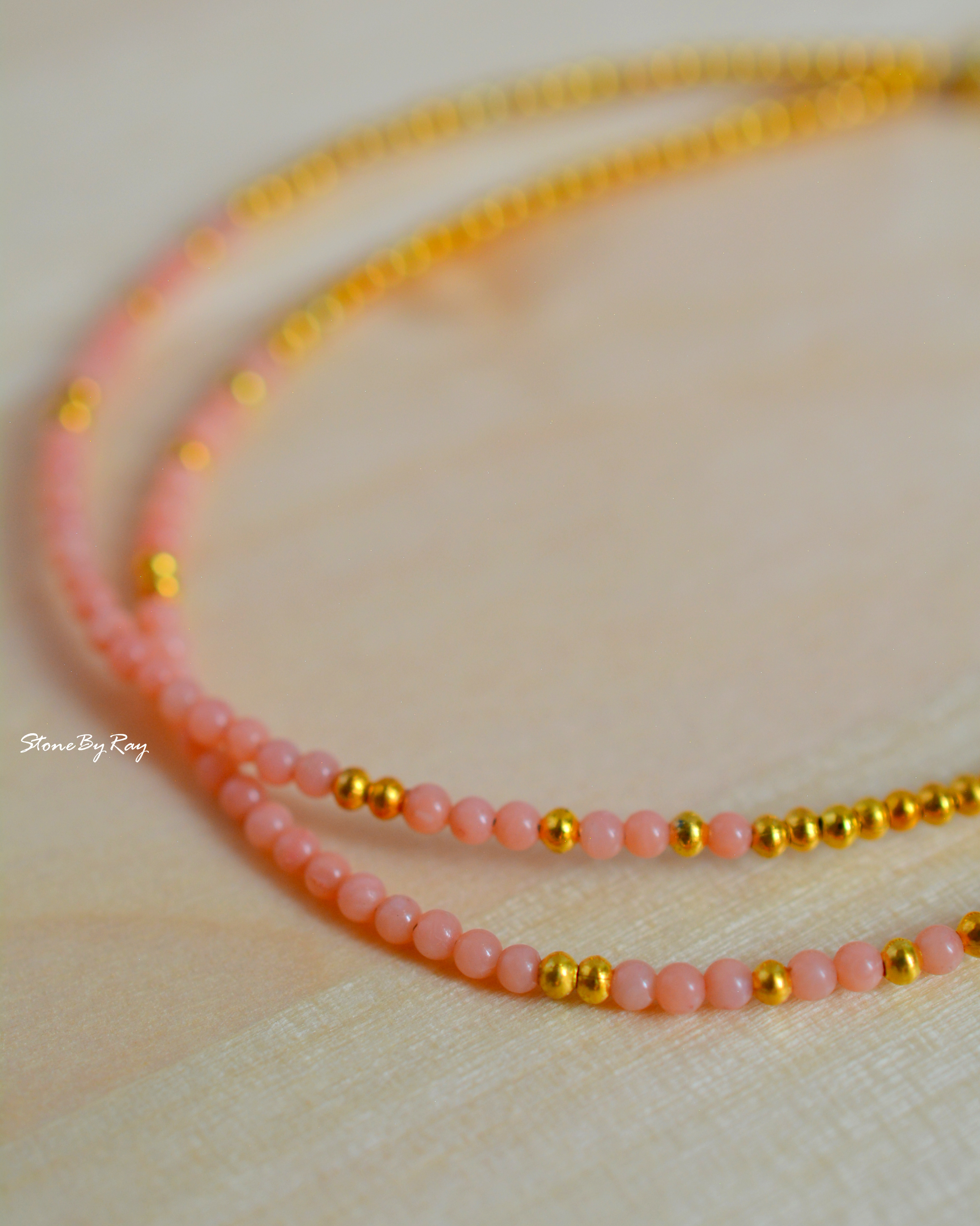 สร้อยข้อมือปะการังสีโอรส(Coral)