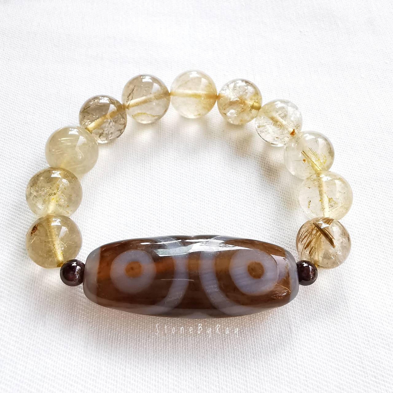 สร้อยข้อมือหินไหมทองกับหินDziลายสามตา
