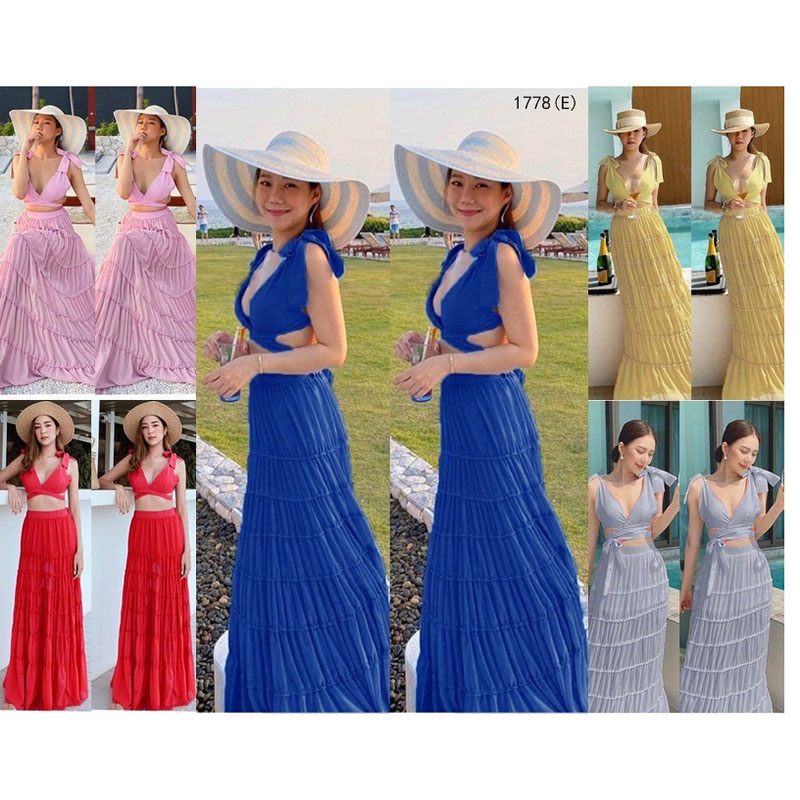 kudapy set 2 ชิ้น สีเหลือง เสื้อบราผูกไหล่ แต่งสายไขว้ผูกหลังเนื้อผ้าโฟร์เวย์สีพื้น + กระโปรงยาว แต่งระบายชั้นๆ เอวสม็อกหลัง