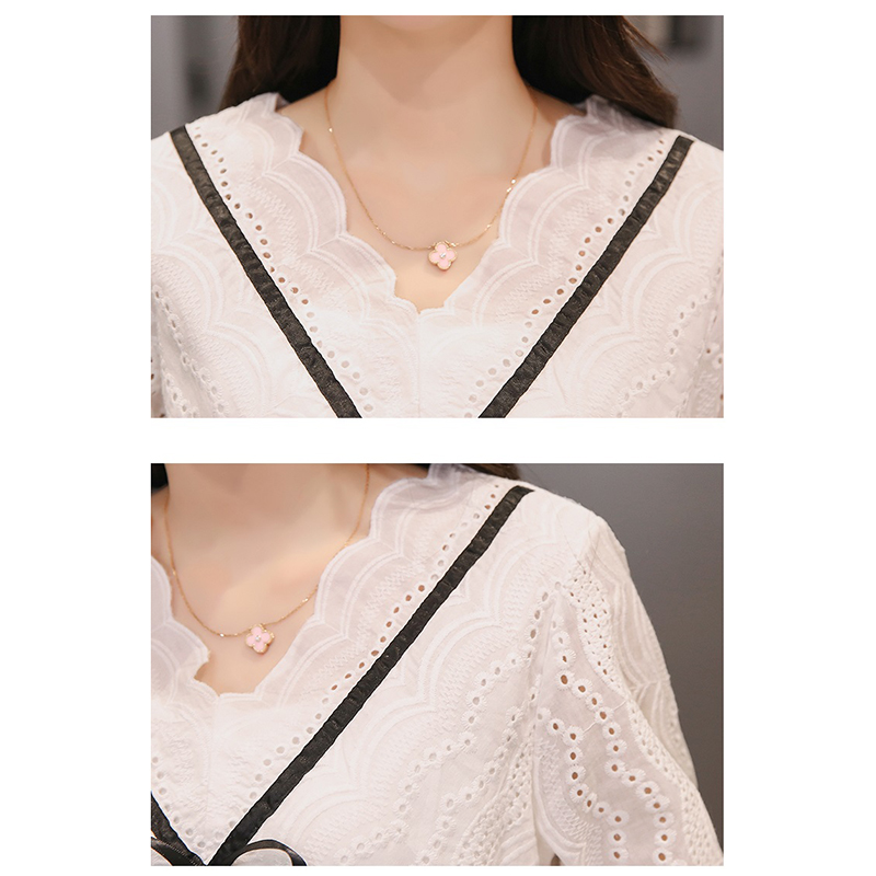 kudapy เดรสสั้นสีขาวดำ ช่วงบนแต่งลูกไม้ กระโปรงผ้าตาข่าย แต่งโบว์และปักมุกช่วงอก เอวสม๊อค จั้มปลายแขน มีซับใน ใส่ทำงาน