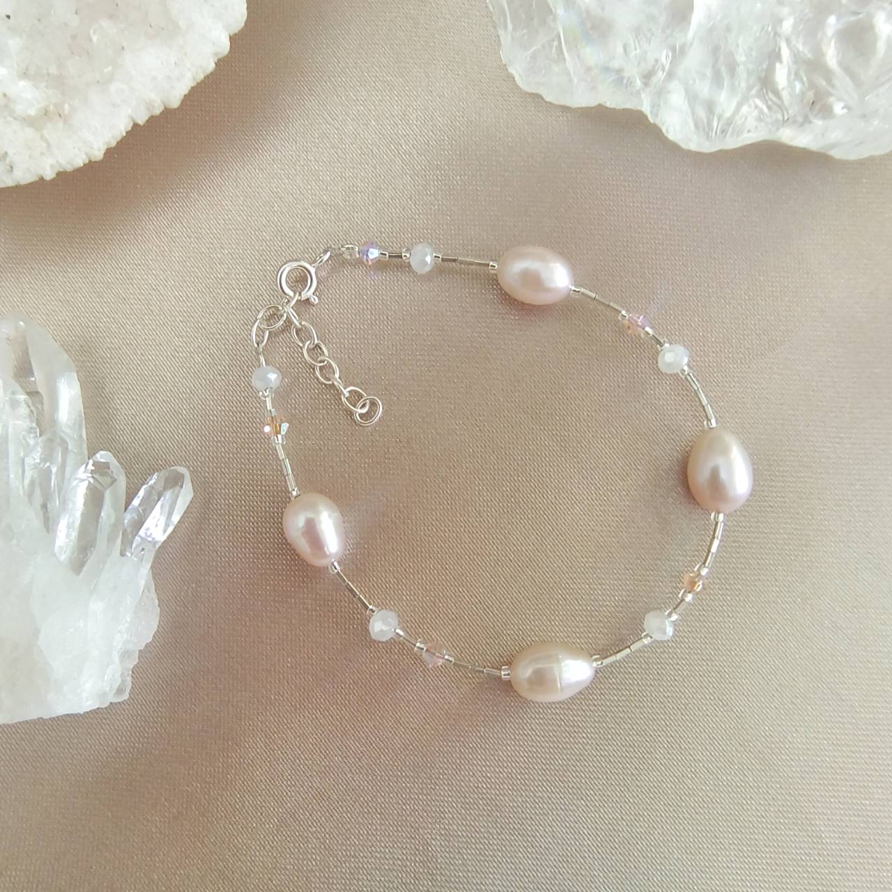 สร้อยข้อมือเงินไข่มุกสีโอรส Pearl