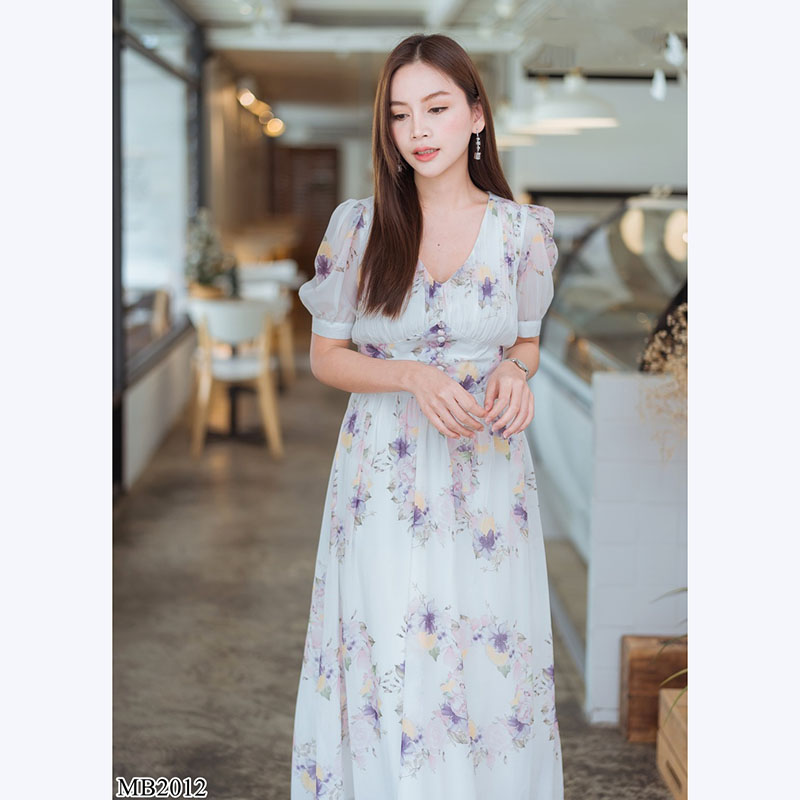 kudapy เดรสยาวสีขาว แต่งกระดุมลายดอกใส่สบายสวยดูดี