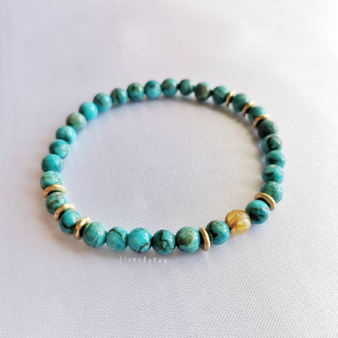 สร้อยข้อมือหินเทอร์ควอยส์ร้อยกับหินไหมทอง Turquoise+Rutilated Quartz