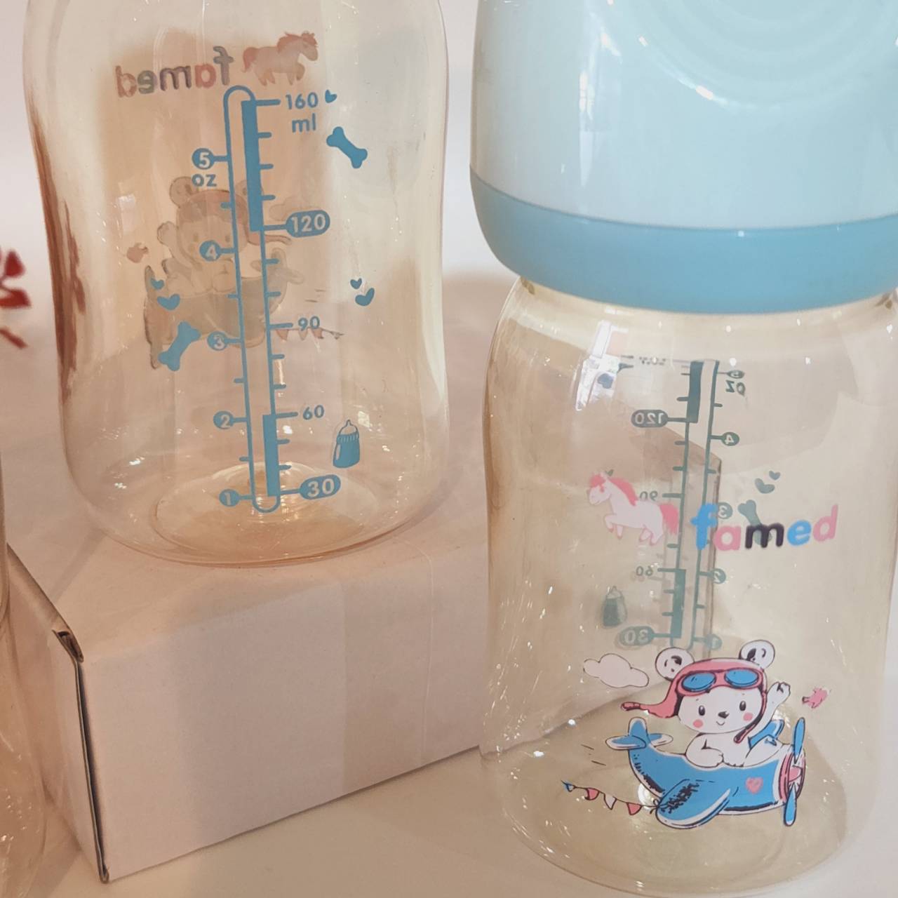 famed ขวดนมสีชา PPSU 5ออนซ์ 8ออนซ์ รุ่น penguin ทนร้อน ทนทาน รับประกันสินค้าทุกขวด