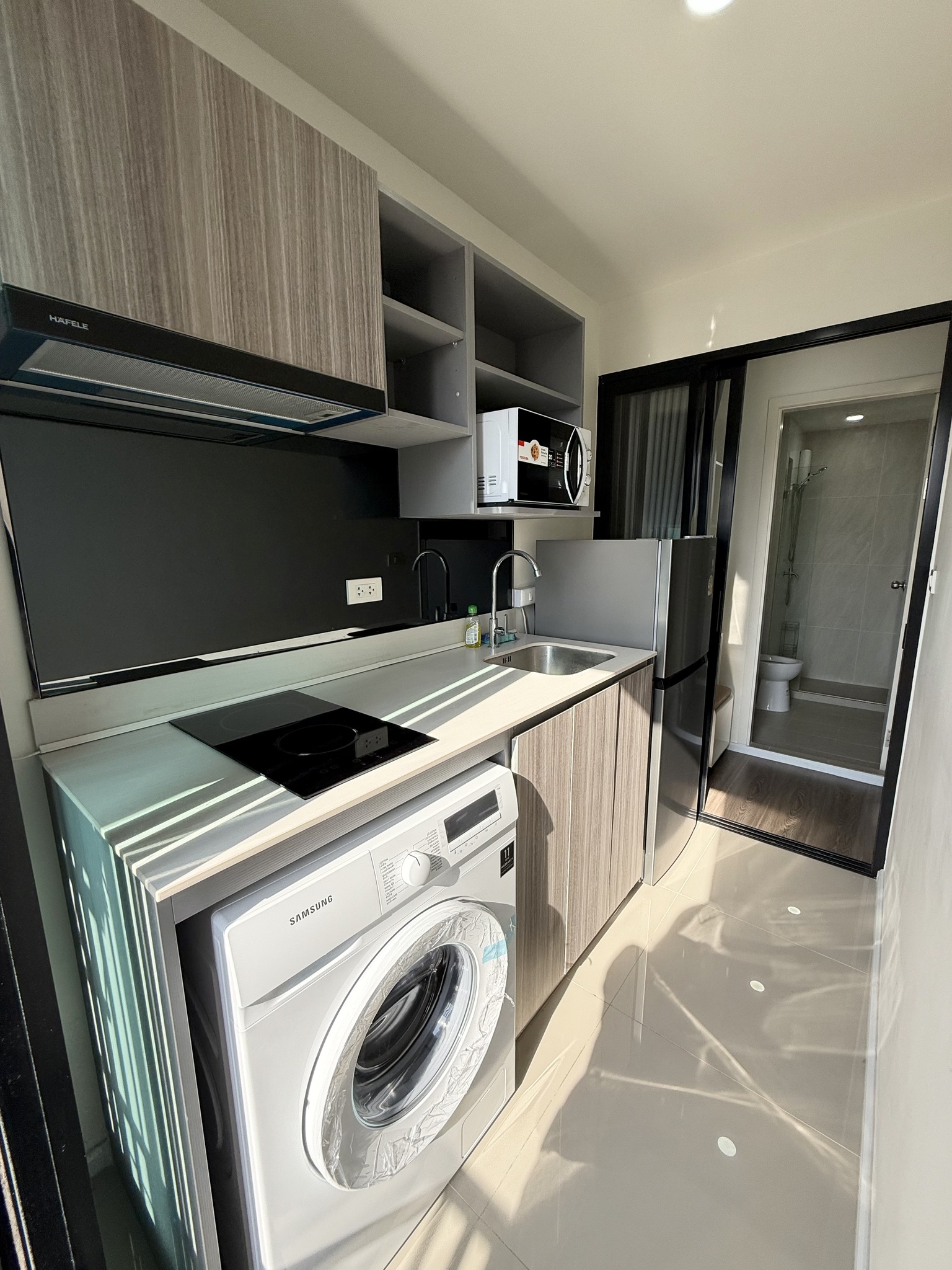 ให้เช่าห้องแบบ 1ห้องนอน 1ห้องน้ำ 1ครัวแยก โซนพื้นที่ MRT รามอินทรา กม.9 คอนโด The Origin Ramintra 83 Station (ดิ ออริจิ้น รามอินทรา 83 สเตชั่น) Low Rise ขนาดห้อง 26 ตรม. ชั้น 5 ตึก A