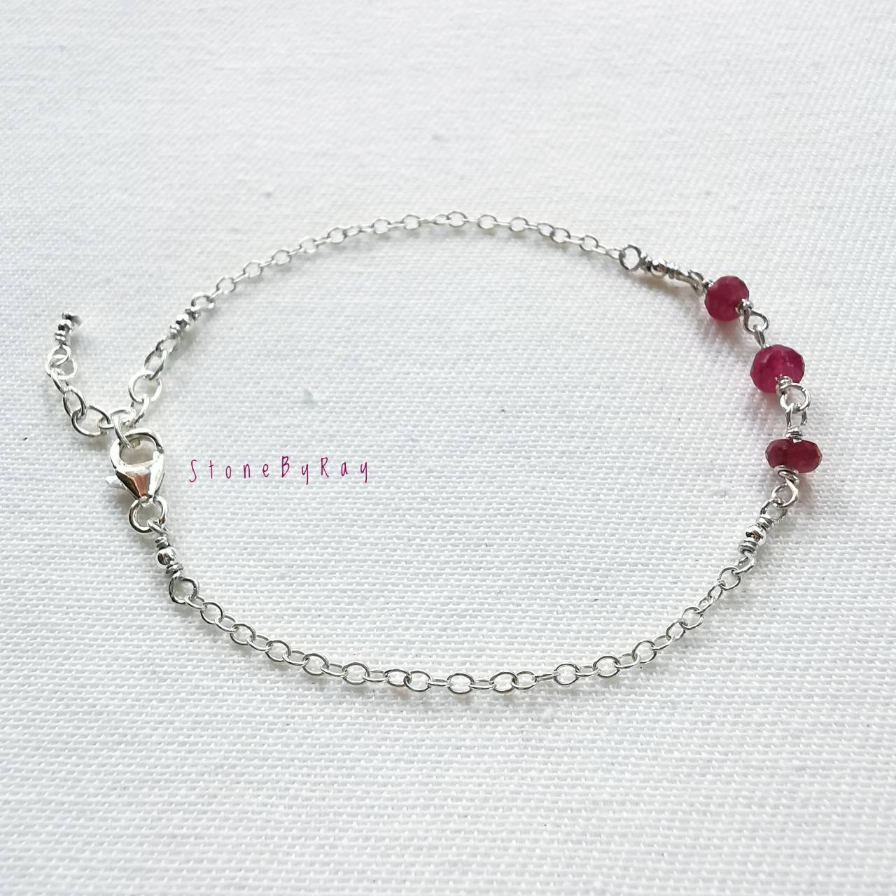 สร้อยข้อมือเงินดีไซน์กับพลอยทับทิมแท้(Ruby)