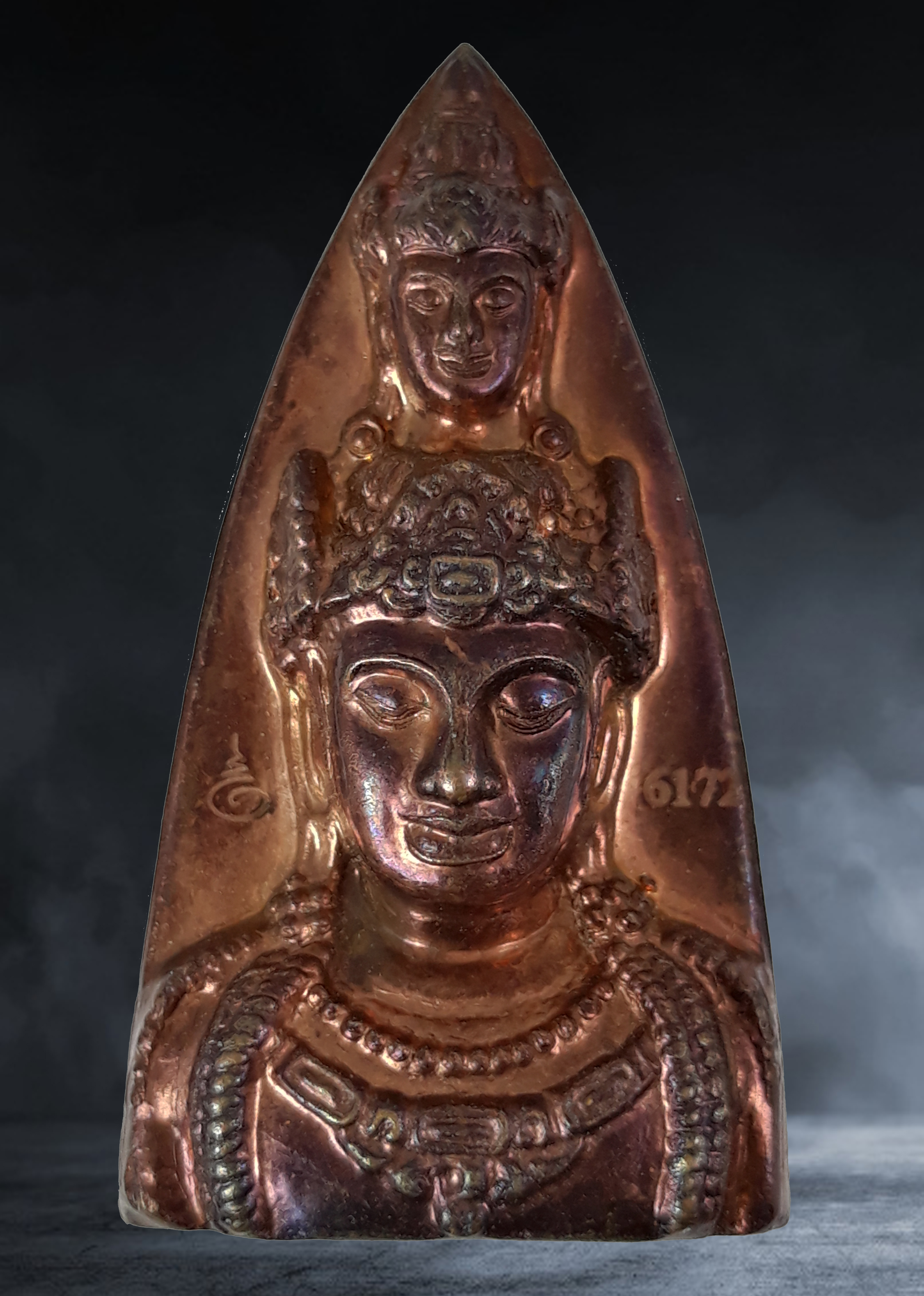 เหรียญหล่อเตารีด เศียรองค์พ่อจตุคามรามเทพ ศาลหลักเมืองนครศรีธรรมราช จ.นครศรีธรรมราช รุ่นสมบัติจักรพรรดิ ปี ๒๕๕๐