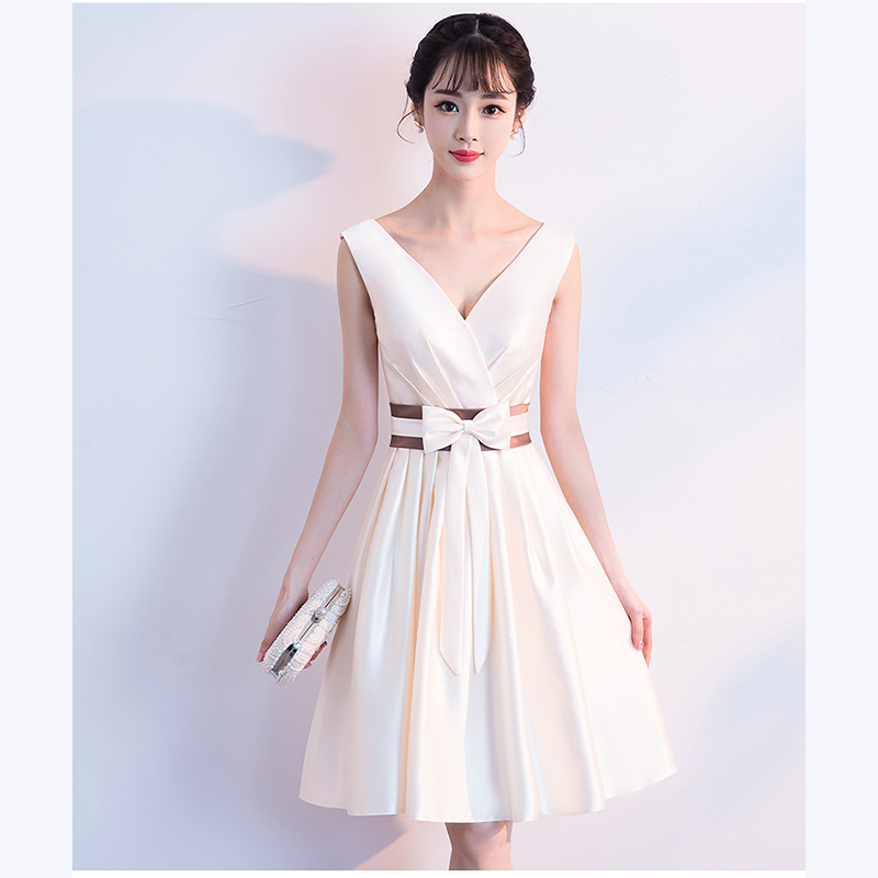 kudapy เดรสสั้นสีครีม/ม่วง แขนกุด ผ้าซาติน คาดเอวสีทอง แต่งโบว์ตรงเอว