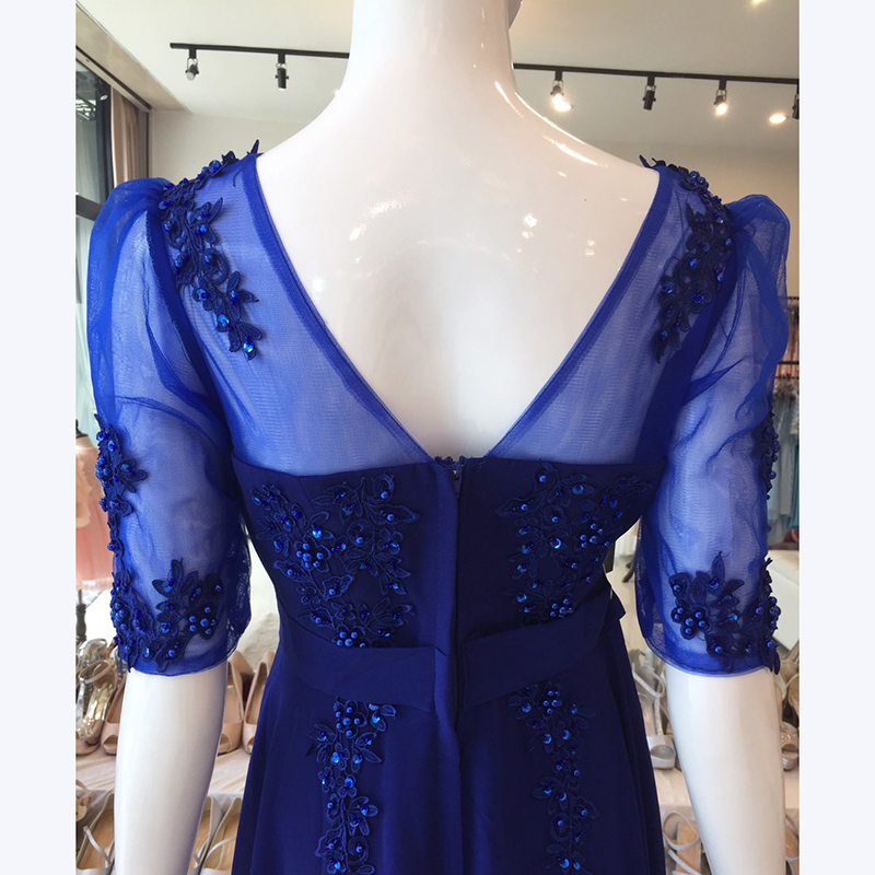 kudapy ชุดราตรียาว สีน้ำเงิน แขนยาว แบบเรียบหรู แต่งลูกไม้เซาะดอก ปักลูกปัดมุก