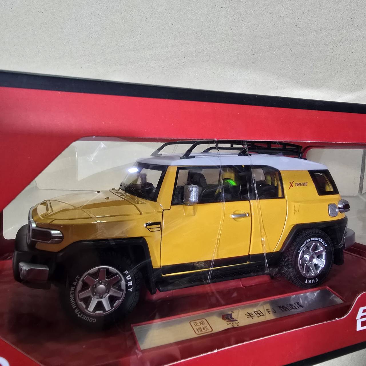 รถเหล็ก 6971697756676 C4173 1:24 Toyota FJ Land Cruiser X treme