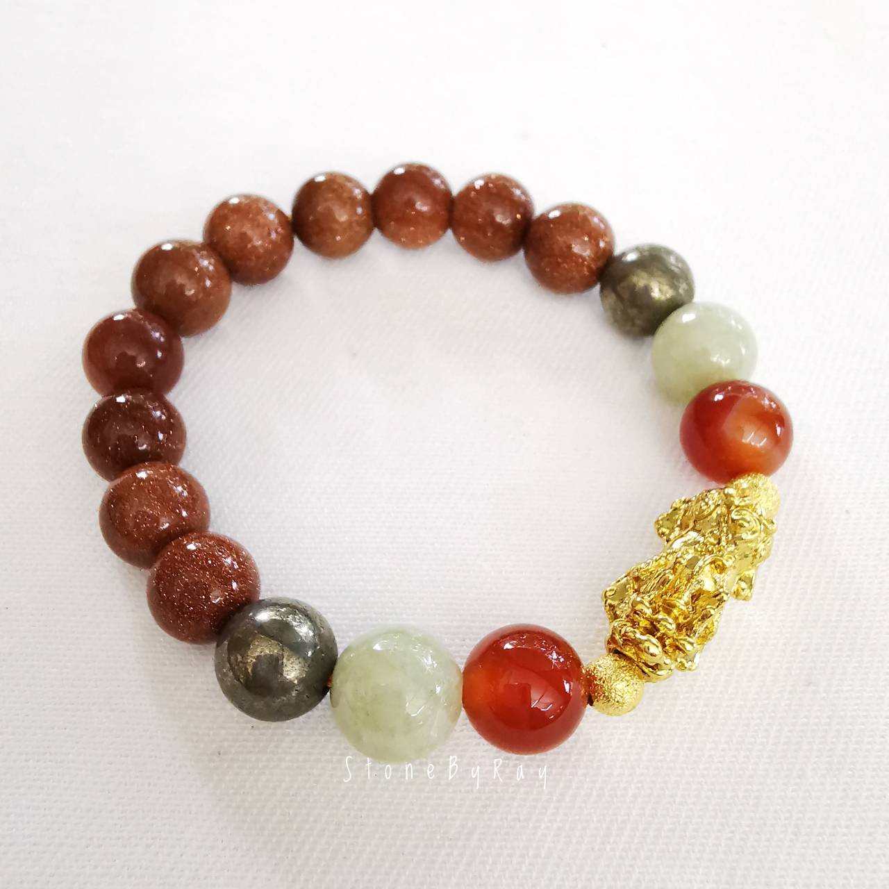 สร้อยข้อมือหินคาเนเลี่ยน,หินทรายทอง,หยก,ไพไรต์ร้อยกับปี่เซี่ยะสีทอง