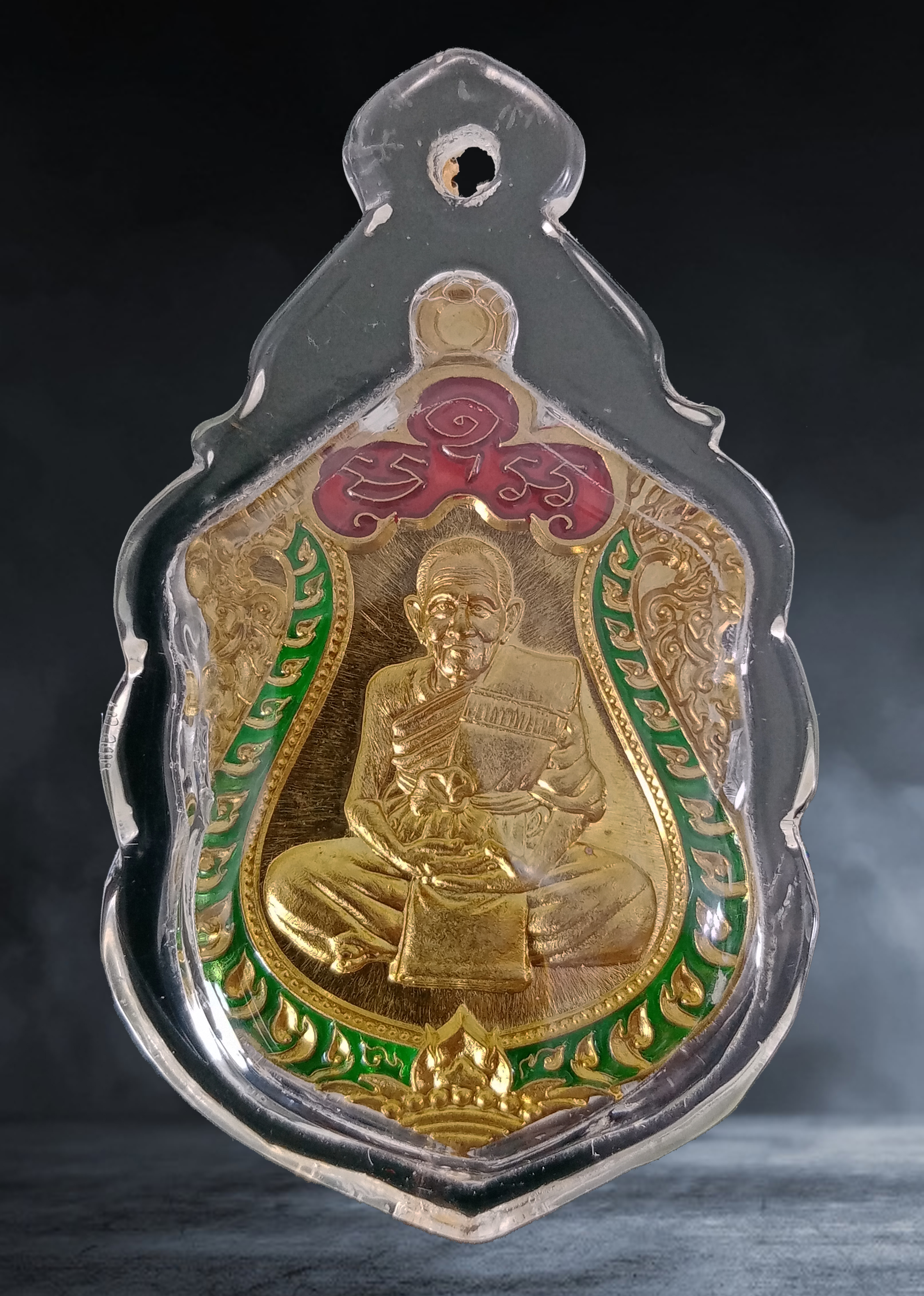 เหรียญเสมา หลวงปู่แสน วัดบ้านหนองจิก จ.ศรีสะเกษ รุ่นแสนร่ำรวย เนื้อทองทิพย์ลงยา หมายเลข ๕๘๔ ปี ๒๕๖๑