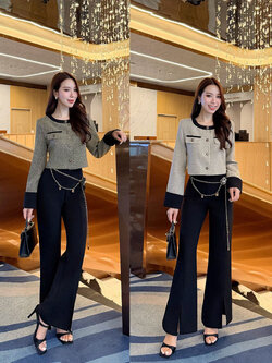 kudapy เซ็ทเสื้อครอปสูท ผ้าเนื้อทอแน่นสีสวยคลาสสิก ตัดต่อขอบสีดำบริเวณคอ แขน และชายเสื้อ เพิ่มความคมชัด กระดุมหน้าเรียงแนวตั้งแบบมินิมอล