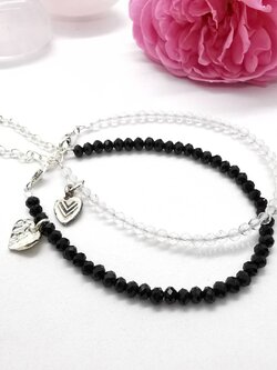 สร้อยข้อมือคู่แบล็กออนิกกับคริสตัลควอตซ์