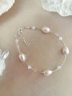 สร้อยข้อมือเงินไข่มุกสีโอรส Pearl