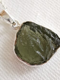 สร้อยคอเงินจี้สะเก็ดดาวโมดาไวต์