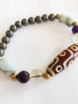 สร้อยข้อมือหินไหมทอง,อเมทิสต์,หยก,ไพไรต์ร้อยกับหินทิเบตลาย9ตา